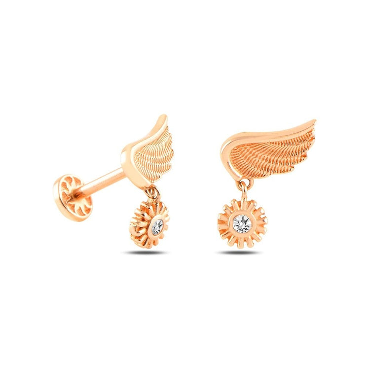 14k Gold Solitaire Sun Model Tragus Piercing on Wing Tip