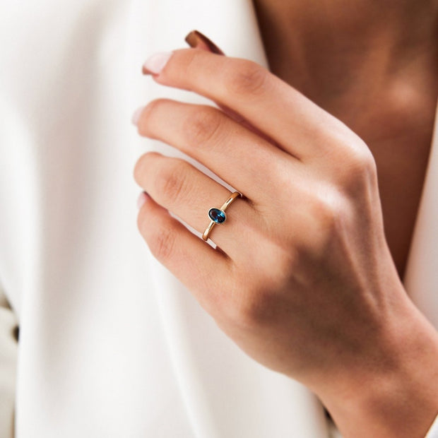 14k Gold Oval Blue Topaz Ring
