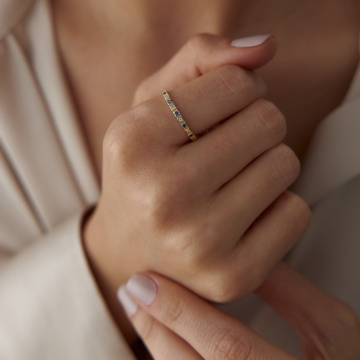 14k Gold Ring with Blue Topaz Details