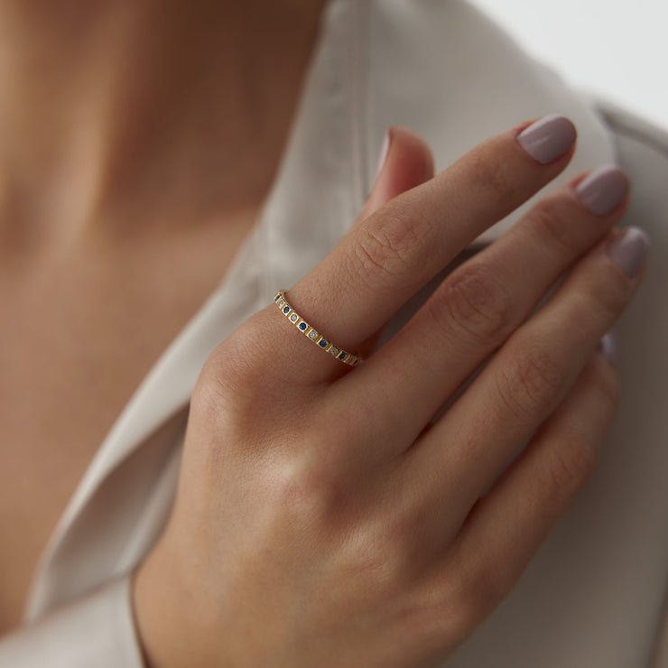 14k Gold Ring with Blue Topaz Details